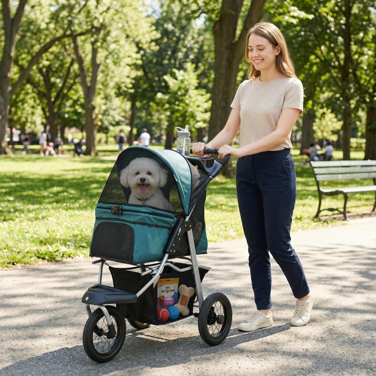 Small pet stroller with dark green canopy, black seat, and adjustable handle
