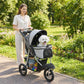Light gray dog stroller with black wheels and mesh canopy for small dogs