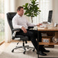 Black ergonomic office chair with headrest, padded arms, and lumbar support