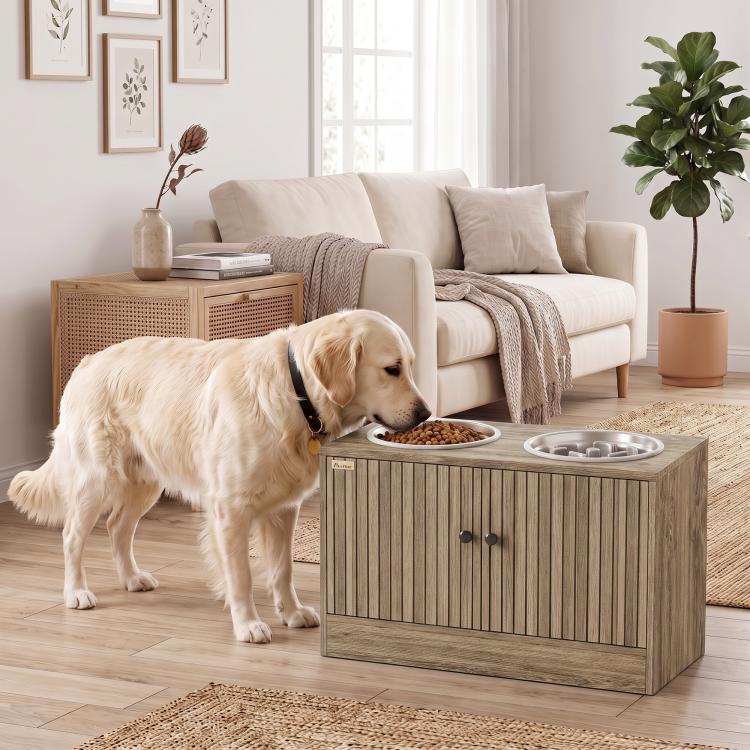 Wood-grain dog feeding cabinet with two stainless bowls and slow-feeder insert