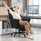 Reclining office chair with headrest, footrest, and padded armrests, black