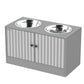Gray elevated dog feeder cabinet with two stainless steel bowls on top