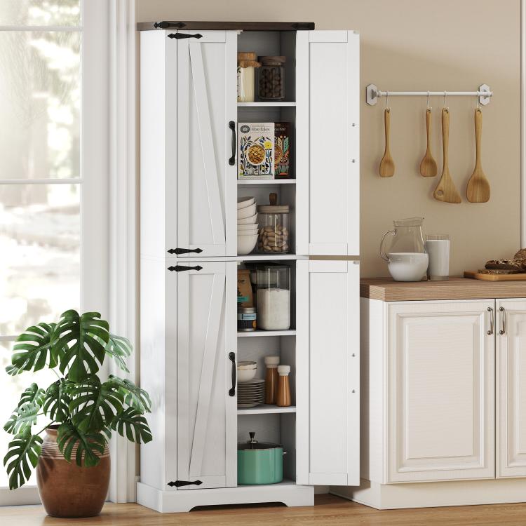 White pantry cabinet with open barn doors showing shelves stocked with kitchen items