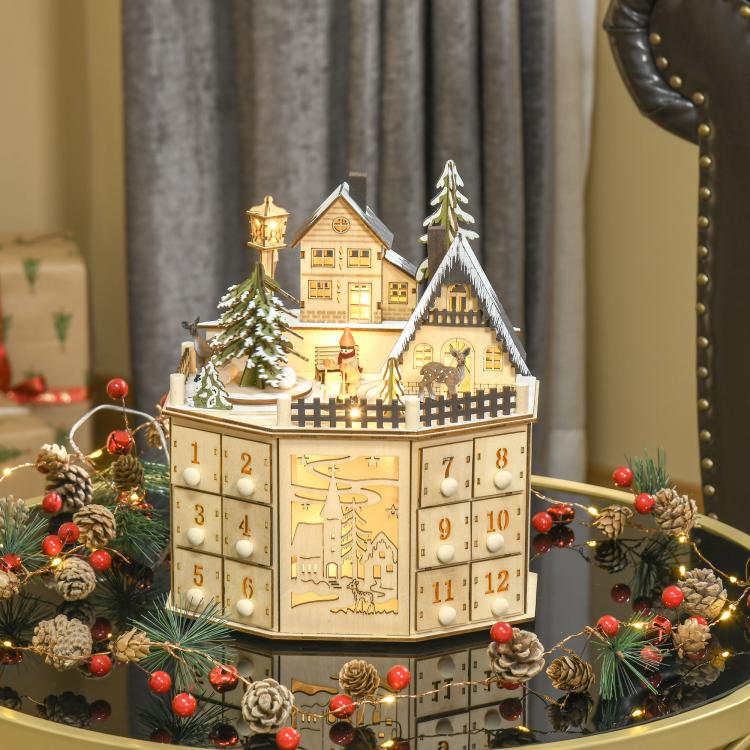 Wooden light-up Christmas advent calendar with glowing village houses and numbered drawers