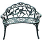 Green metal garden bench with rose floral backrest scrollwork and decorative lattice seat
