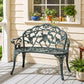 Green cast aluminum bench with ornate rose-and-leaf backrest and openwork seat