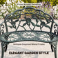 Green cast aluminum bench with floral accent detailing on arched back and patterned seat