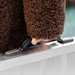 Aluminum folding wheelchair ramp with black non-slip surface and end traction