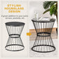 Black hourglass design side table with round tabletop and vertical wire basket frame
