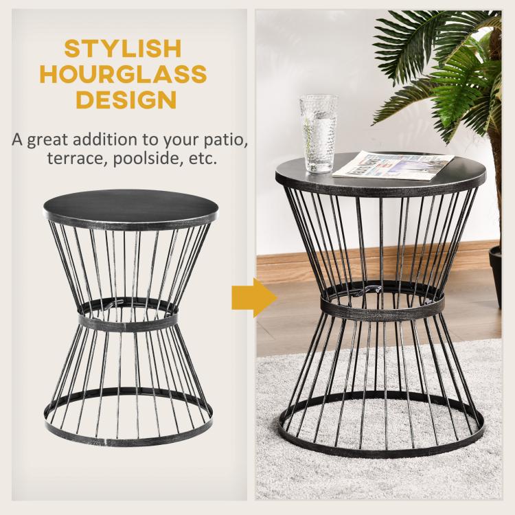 Black hourglass design side table with round tabletop and vertical wire basket frame