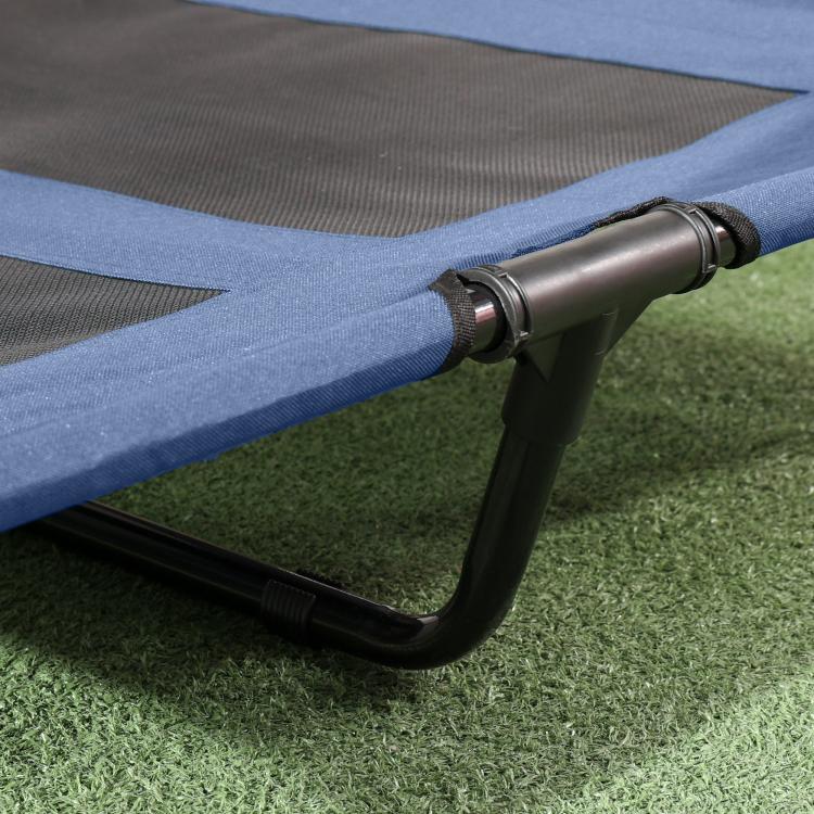 Elevated dog cot with dark blue frame and mesh fabric, black curved legs detail