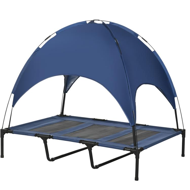 Portable elevated dog cot with dark blue canopy and raised mesh sleeping surface