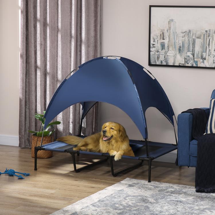 Dark blue elevated dog cot with removable canopy shade and mesh bed