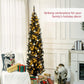 Pre-lit slim pencil Christmas tree with warm white LED lights in a home setting