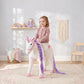 White plush ride-on horse toy with purple braided mane and pink accents
