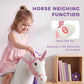 White plush ride-on horse toy with purple mane and pink ear bows