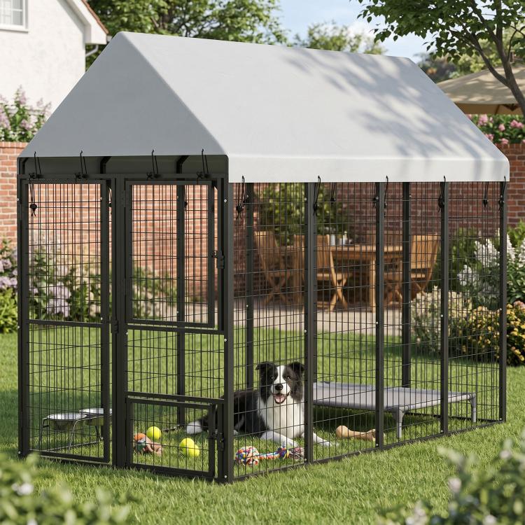 Heavy-duty outdoor dog kennel with sloped roof, black metal and hinged front doors
