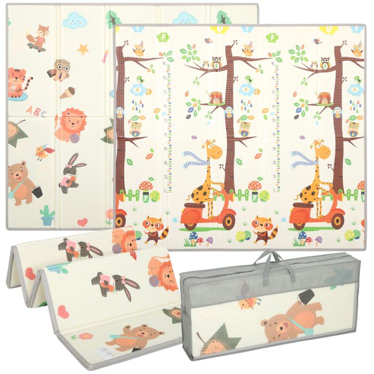 Foldable baby play mat with reversible woodland animal prints and trees, cream and green