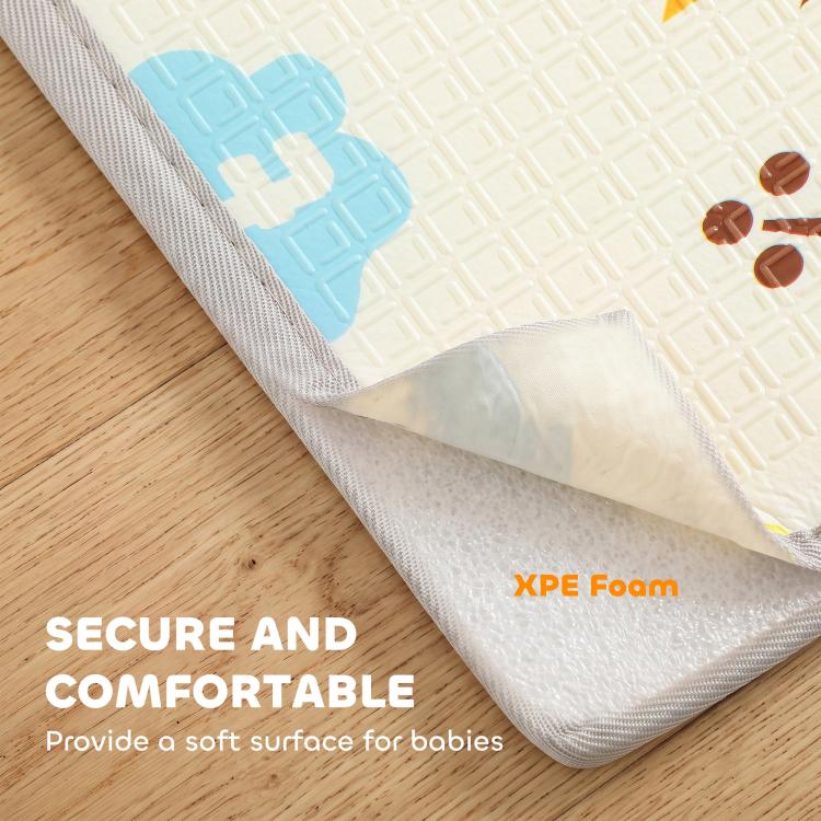 Foldable play mat corner with gray fabric edge and textured underside