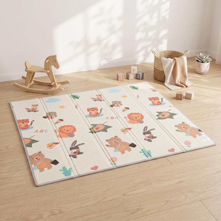 Foldable reversible baby play mat with woodland animals and ABC letters in colorful print