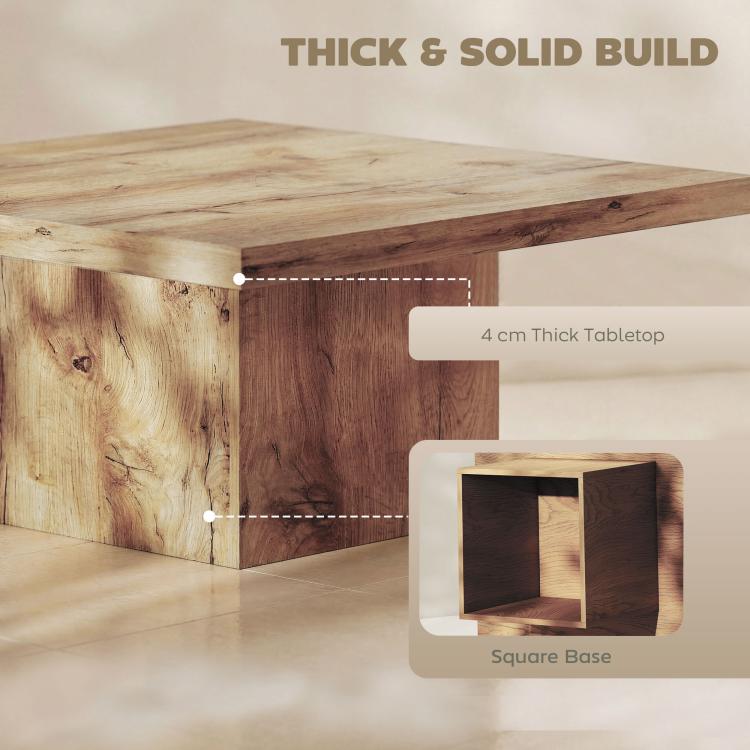 Square coffee table showing thick solid tabletop and square base construction