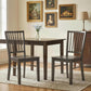 Charcoal gray armless dining chairs with tall vertical slat backrests and square wooden legs