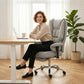 Light gray office chair with padded armrests, recline mechanism, and chrome swivel base