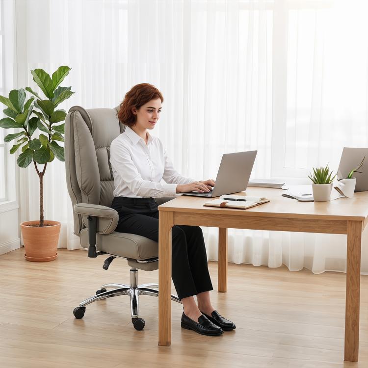 Light gray high-back office chair with padded armrests on caster base for desk use