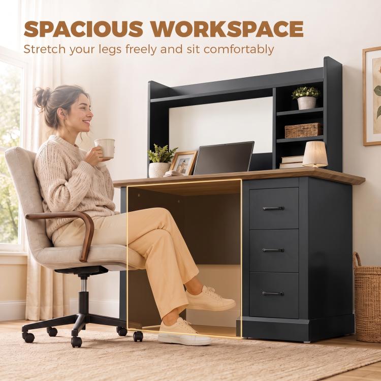 Walnut and black computer desk with open shelves, three drawers, and leg space