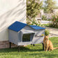 Elevated cat house with blue roof, front doorway, and oval side window