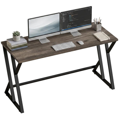 Industrial writing desk with distressed gray top and Z-shaped black metal legs
