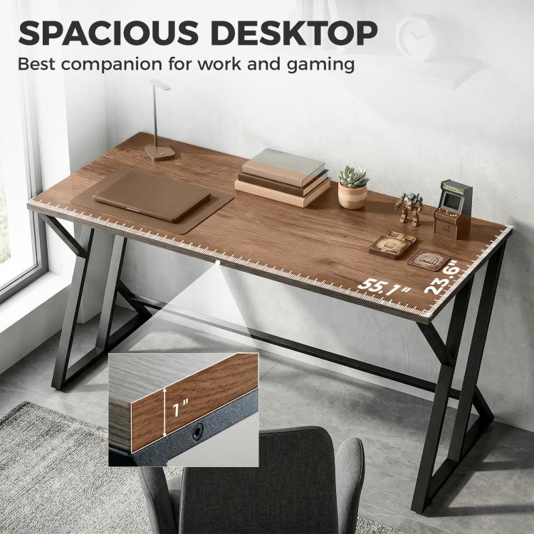 Espacious desktop desk with distressed finish and black Z-shaped metal frame