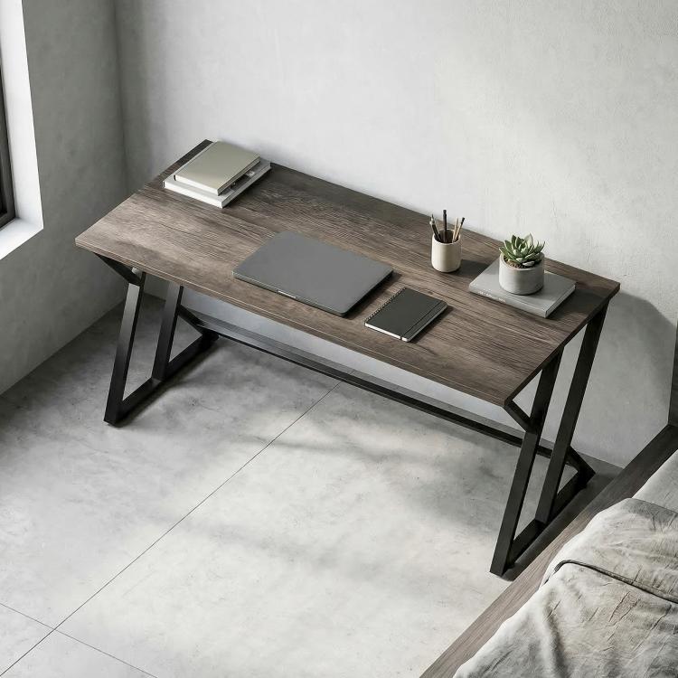Distressed gray desk with black Z-legs and flat rectangular work surface