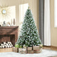 Snow-dusted artificial fir Christmas tree with pine cones on a metal stand