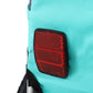 Green dog bike trailer side panel with red rear reflector and black trim