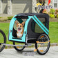 Green dog bike trailer with mesh sides, inflatable rear wheel, and safety flag