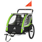 Green and black double-seat bike trailer with orange safety flag, side view of windowed canopy