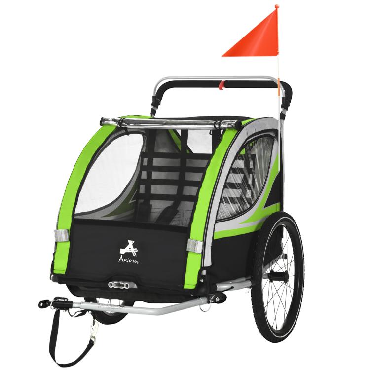 Green and black double-seat bike trailer with orange safety flag, side view of windowed canopy
