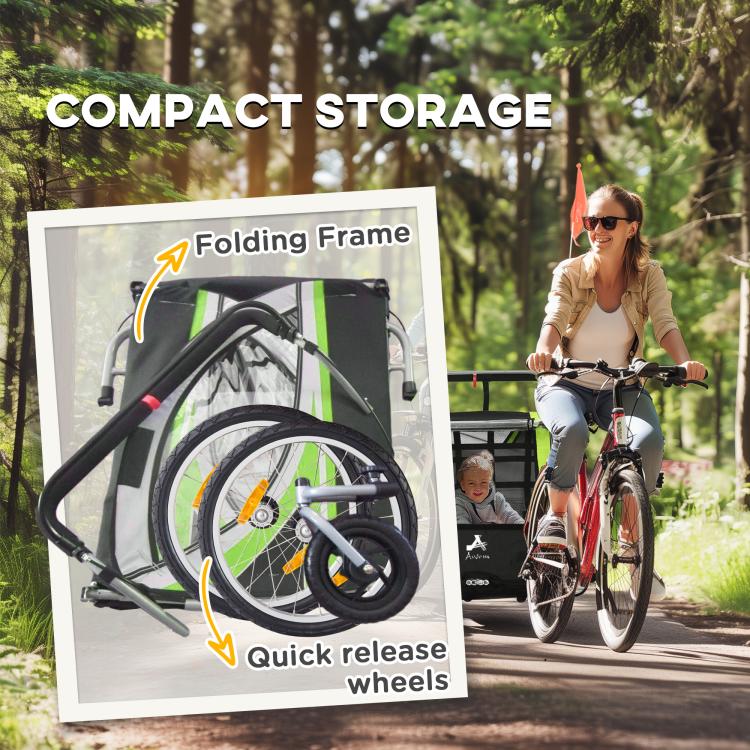 Green double child bike trailer with folding frame and quick-release wheel graphic