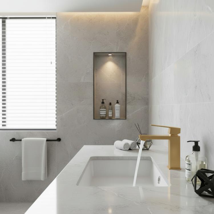 Brushed gold single-handle bathroom sink faucet with long rectangular spout.