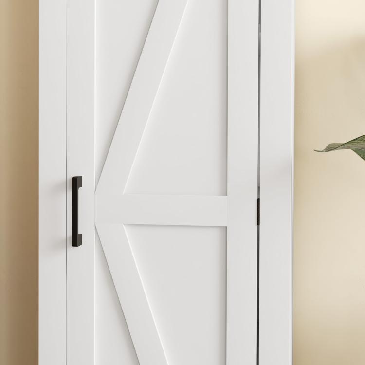 White barn door storage cabinet with black handle, partial door view