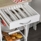 Open drawer with utensil slots on a white kitchen cart above wire basket storage