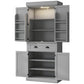 Gray pantry cabinet with open doors, central drawer, and multiple storage shelves