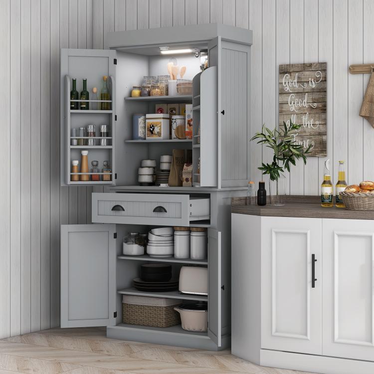 Gray kitchen pantry cabinet with LED-lit interior, shelves, and drawers