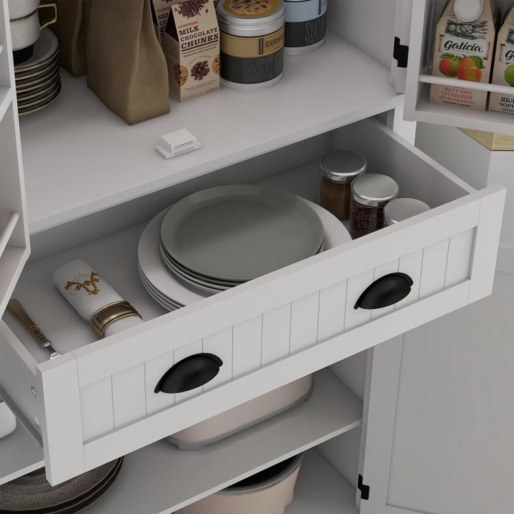White kitchen pantry cabinet with open shelves and drawer, black round pulls