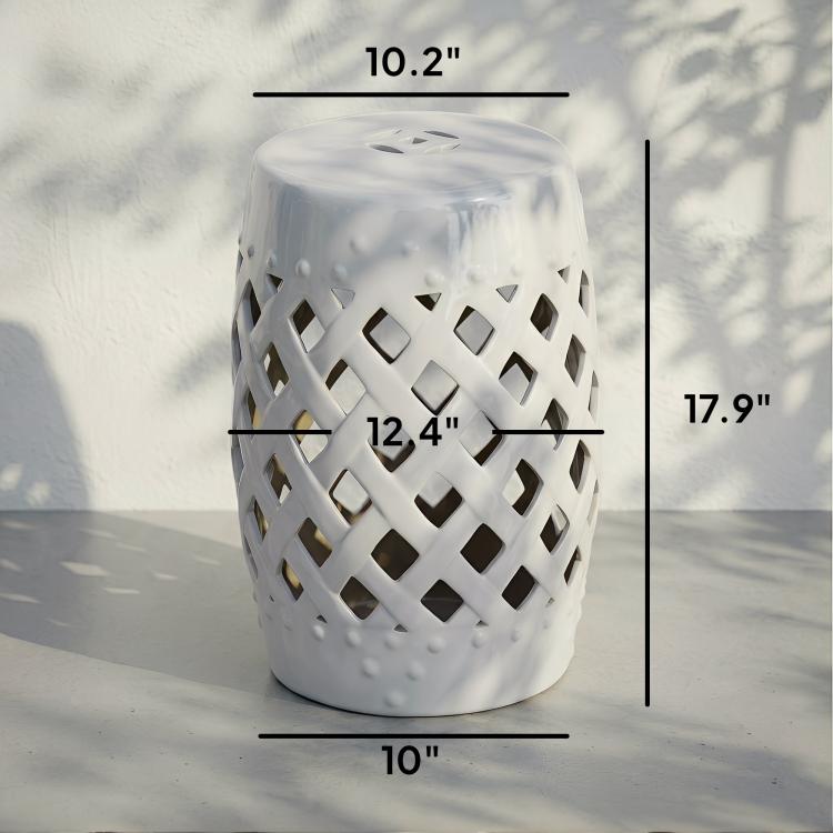 White ceramic garden stool with lattice cutouts and perforated top, 17.9 in tall.