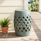 Ceramic garden stool with glazed teal top and diamond lattice cutout body