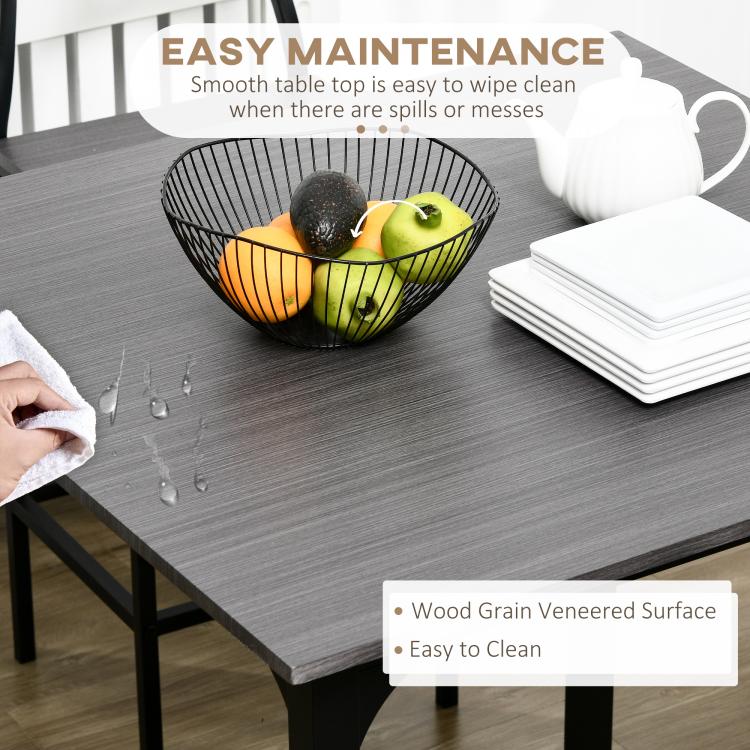 Gray wood-grain tabletop with spill-clean surface and removable-style care notes