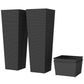 Set of two tall black plastic planters with ribbed texture, plus matching square bin