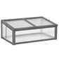 Mini cold frame greenhouse with gray frame and translucent polycarbonate panels, closed lid